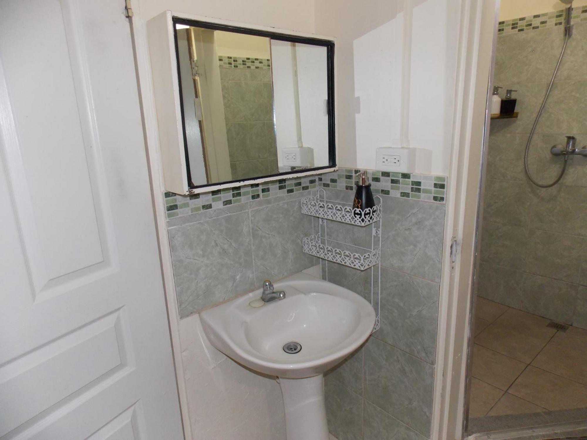 Stewart Apt- Trincity, Airport, Washer, Dryer, Office, Cable , Wifi Room photo
